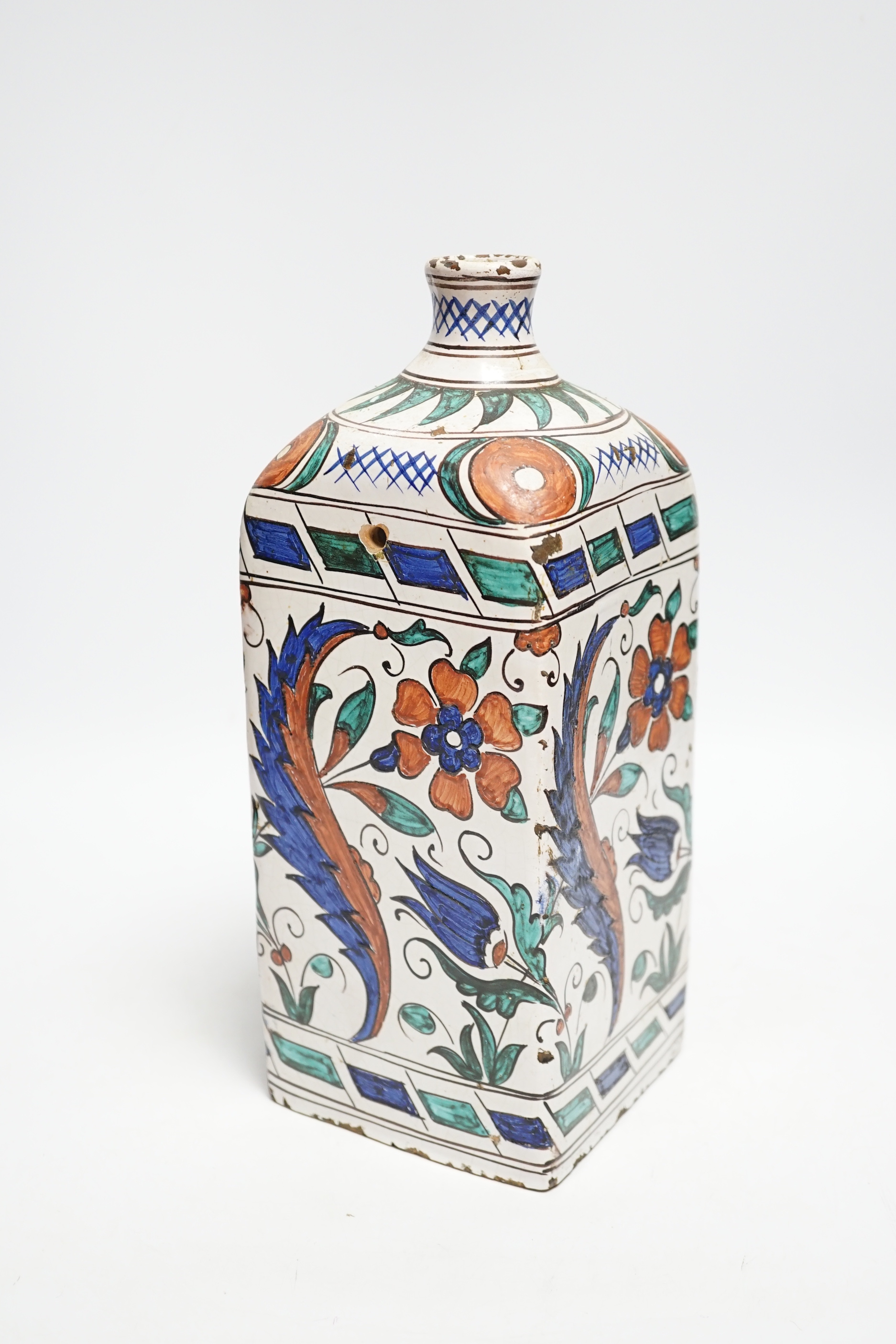 An Iznik style tin glazed flask, 28cm